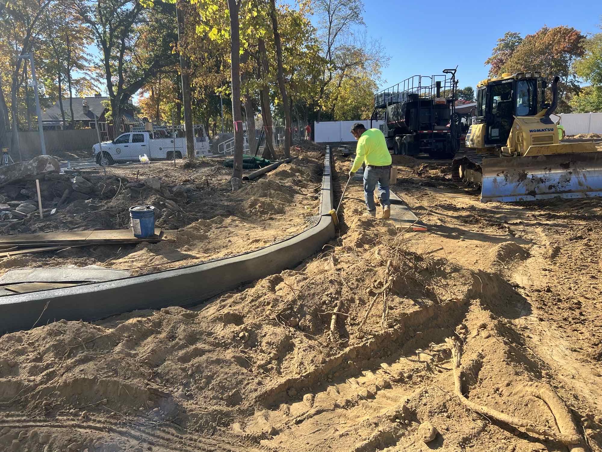 new curb installation in the new parking lot
