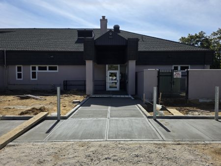 New Concrete walkway for the entrance and community garden