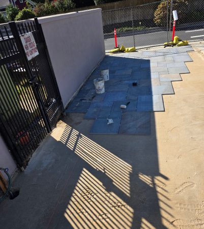 Pavers are being installed in the Community Garden