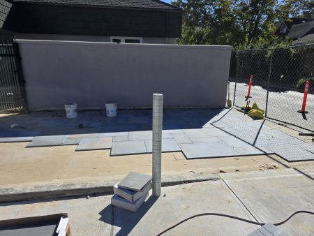 Pavers are being installed in the Community Garden