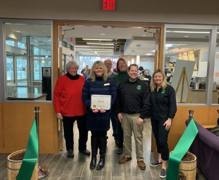 Library Board of Trustees, Administration and Hampton Coffee Company ownership celebrated the ribbon cutting